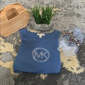 Used in excellent condition MK L shirt